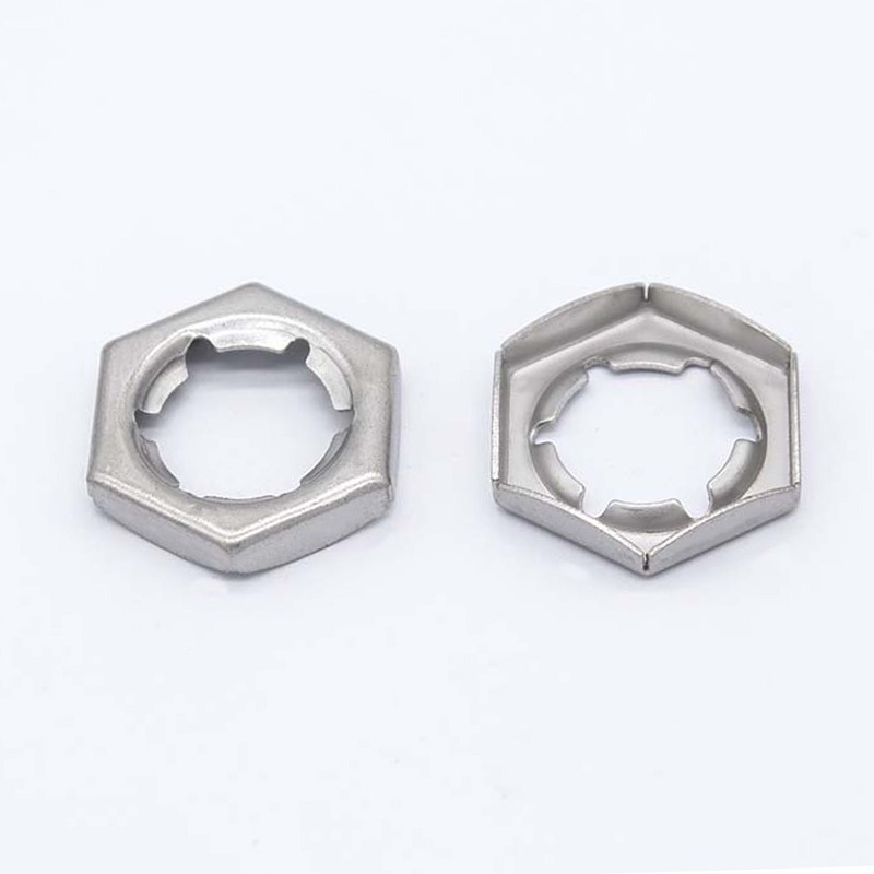 DIN 7967 self-locking pal nut with a hex body and dome-shaped spring skirt, its internal spring-clip teeth gripping a bolt thread