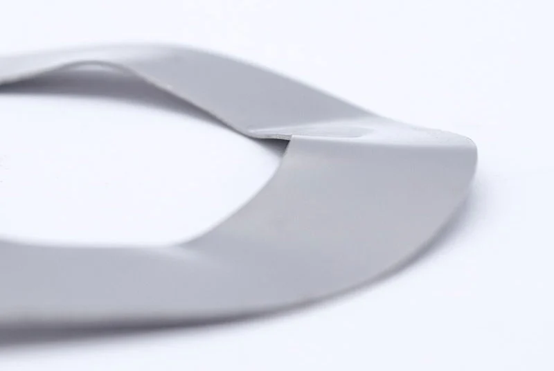 Production batch of curved washers